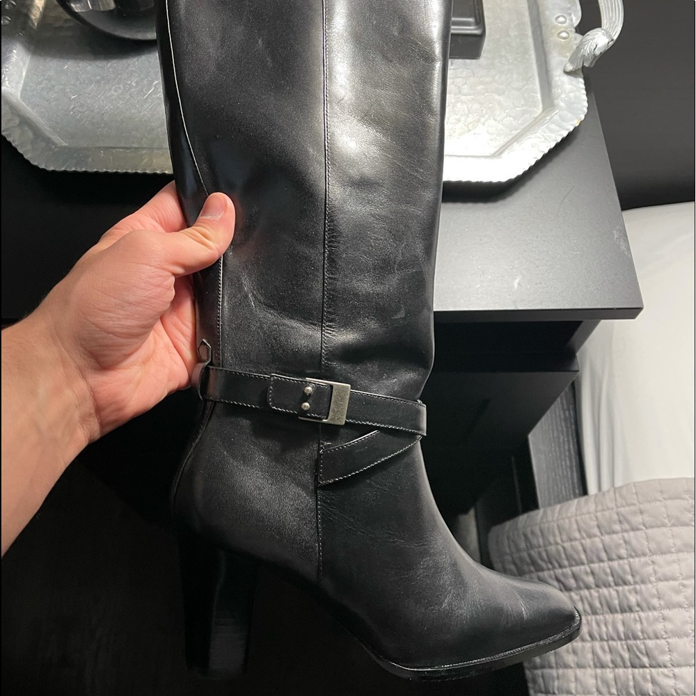 Never worn, brand new, leather heeled women’s boot